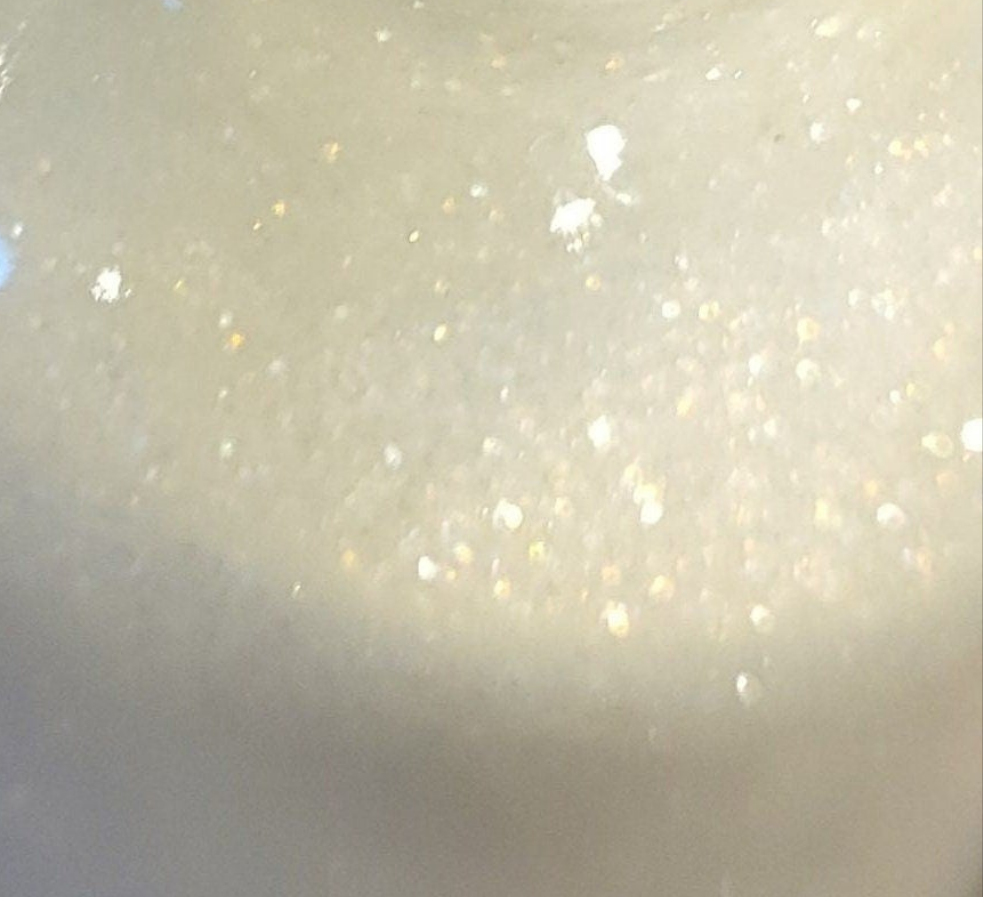 Huile corporelle scintillante