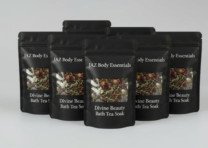 Five black coffee bags with visible branding on a white background