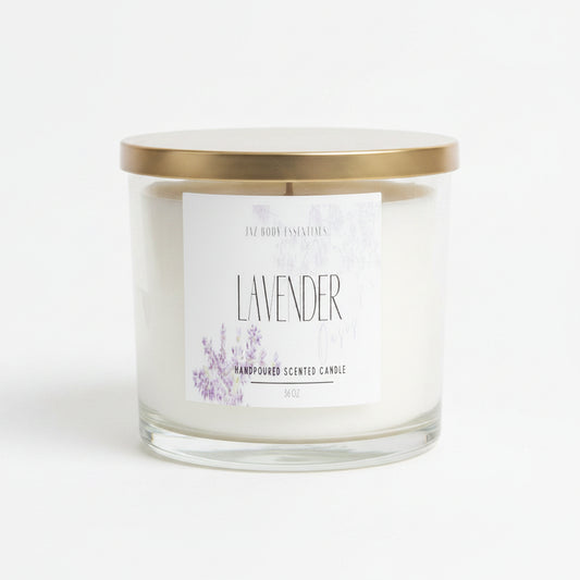 Lavender scented candle with a gold lid on a white background