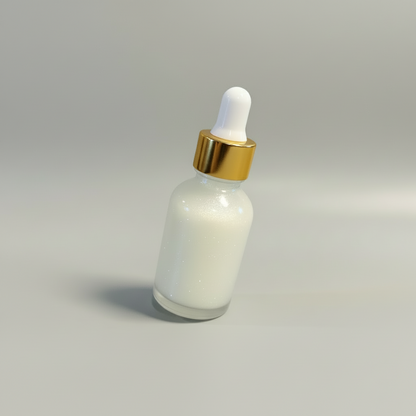 Glass dropper bottle with a gold cap on a gray background