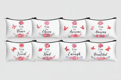 Set of self-worth cosmetic bags with various messages on a white background